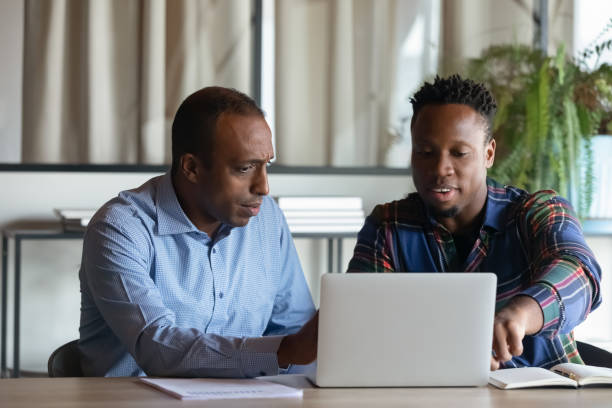 Business consultants reviewing a project plan