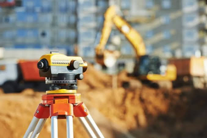 Land survey level instrument on a project site